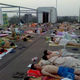 Students sleep on the roof because their dorm is too hot.
